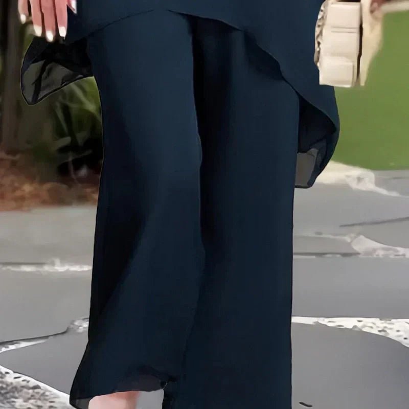 ✨️Nouveaux arrivages✨️Deux-pièces pour femmes : Charmant top asymétrique & pantalon à jambes larges(🔥50 % de réduction)