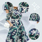 Robe longue à col rond, imprimée et ceinturée