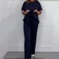 T-shirt à manches courtes avec bandes latérales et pantalon de jogging à jambes larges