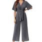 Combinaison élégante à col en V et jambes larges pour femme avec ceinture nouée