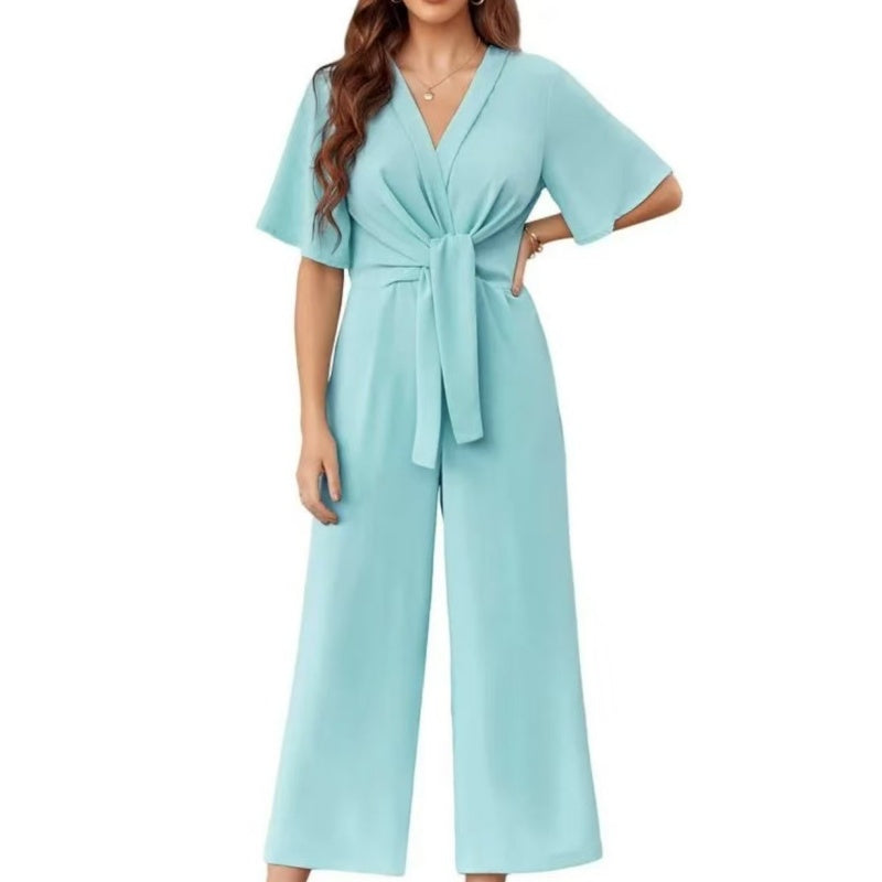 Combinaison élégante à col en V et jambes larges pour femme avec ceinture nouée