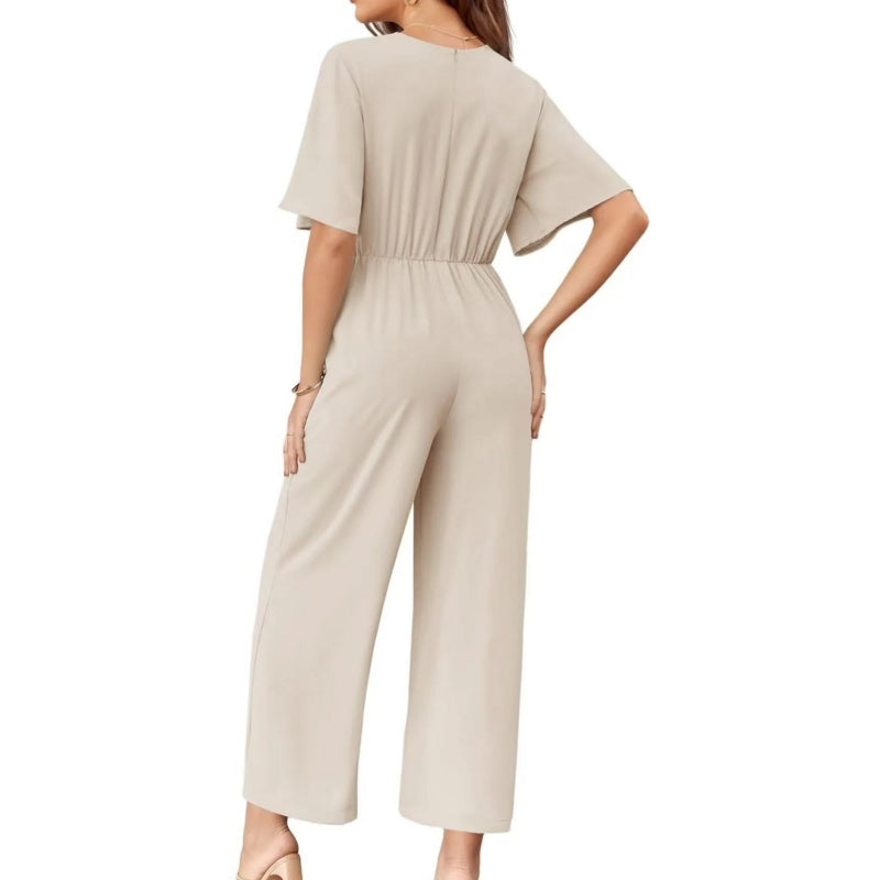 Combinaison élégante à col en V et jambes larges pour femme avec ceinture nouée